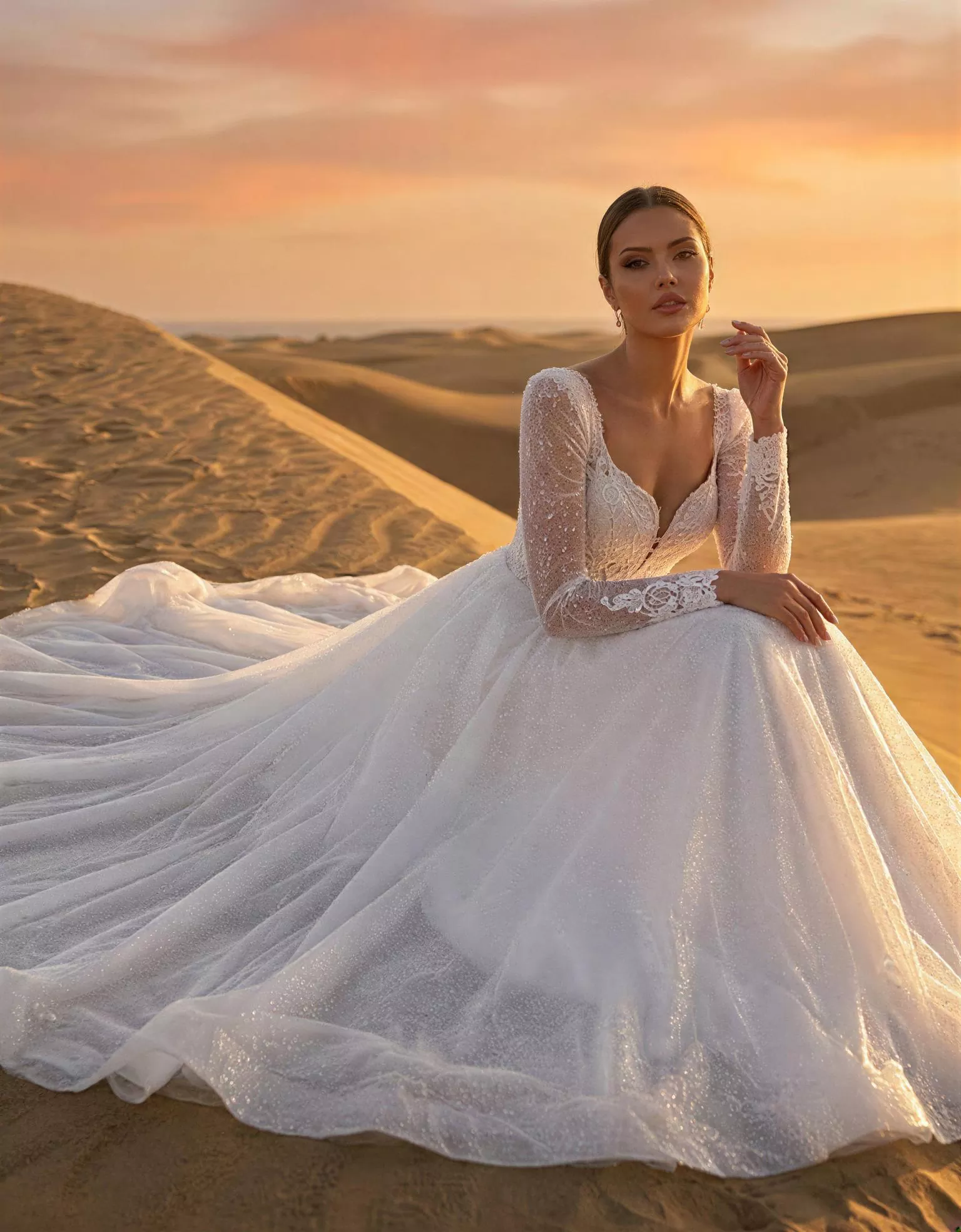 vestido-novia-portent-atelier-romance-pose-frontal-sentada-encaje-escoteenv-espaldaenv-atelierdebodas